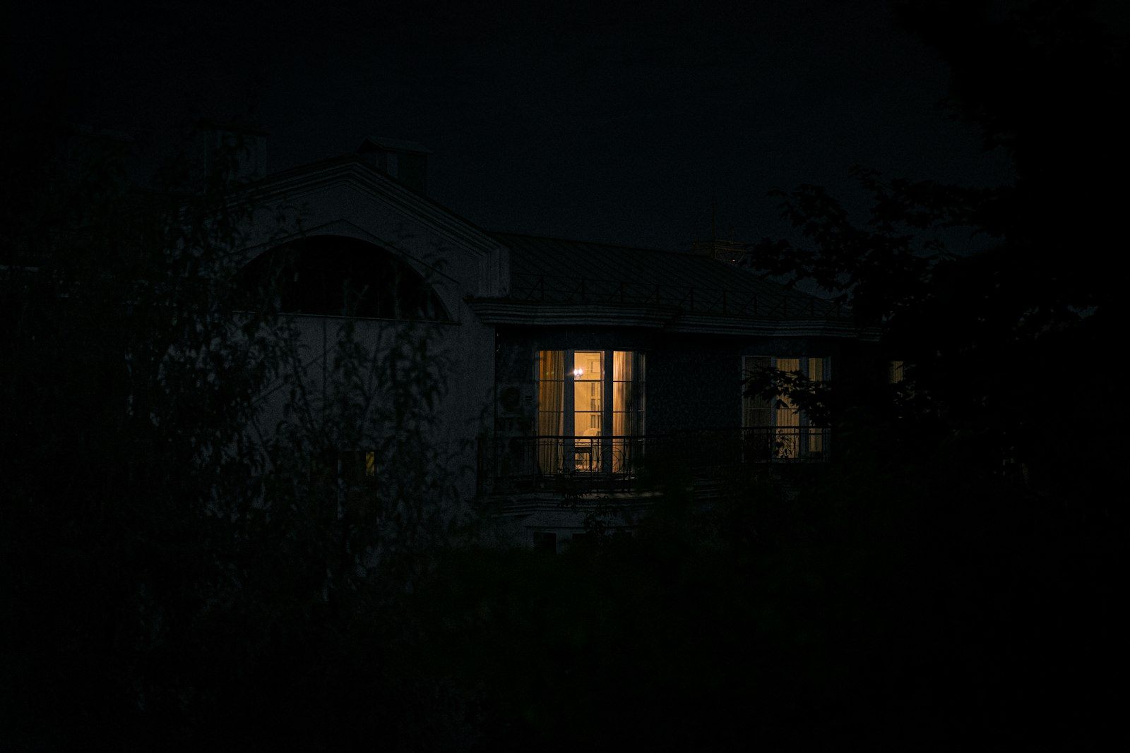Brown wooden house during night time
